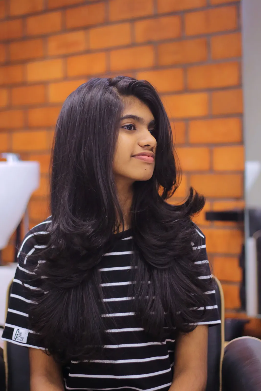 Voluminous layered blow-dry styling