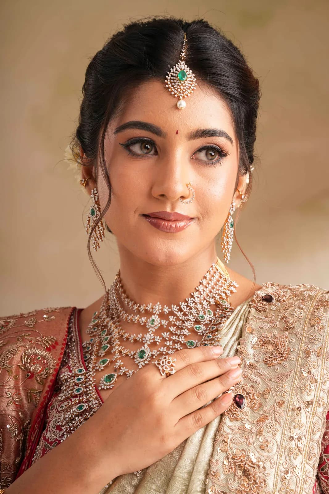Bridal makeup with a maang tikka and statement jewellery