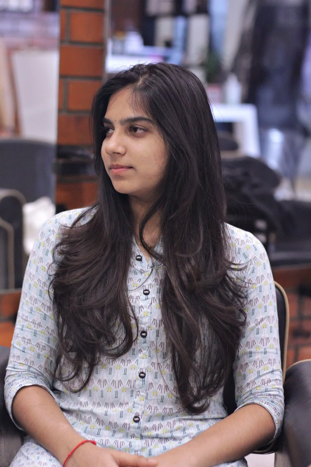 Long layered cut with soft natural waves