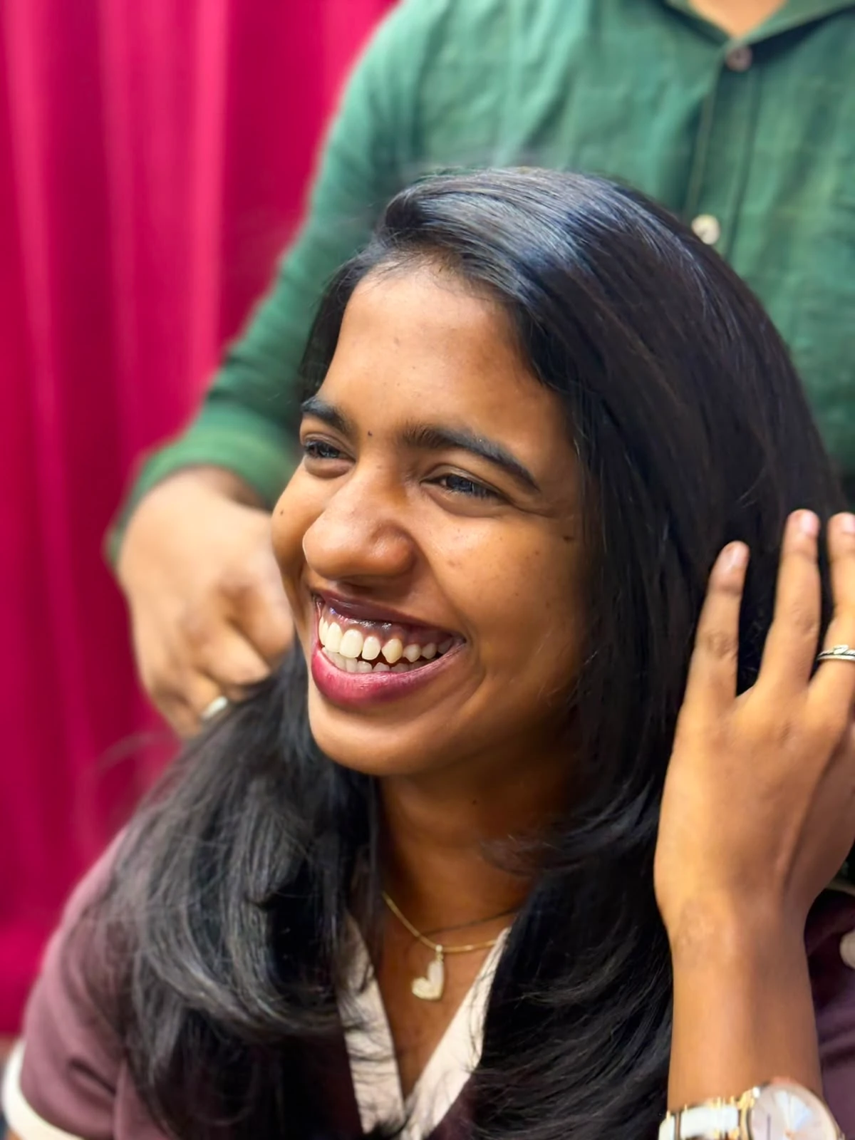 A happy client during a styling session
