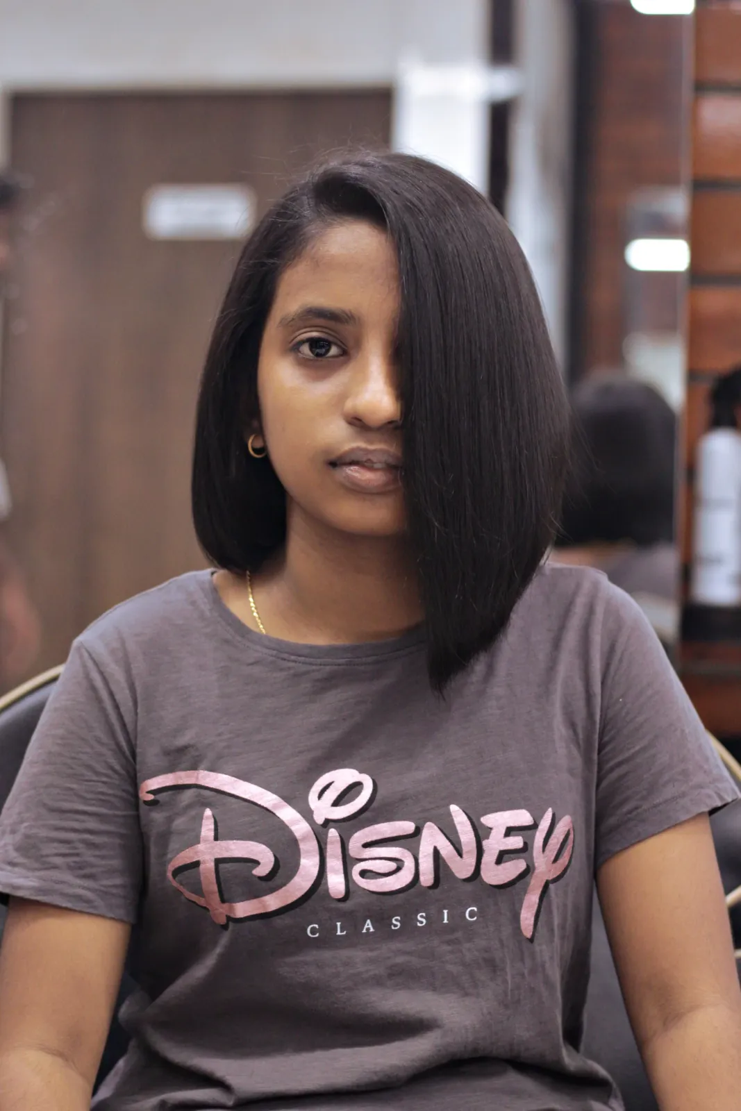 Sleek asymmetric bob with a straightened finish