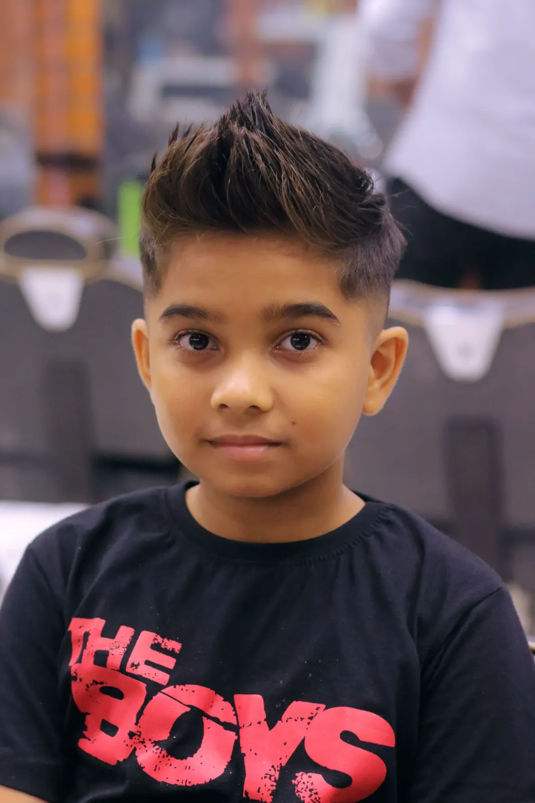Textured spiky fade haircut for kids