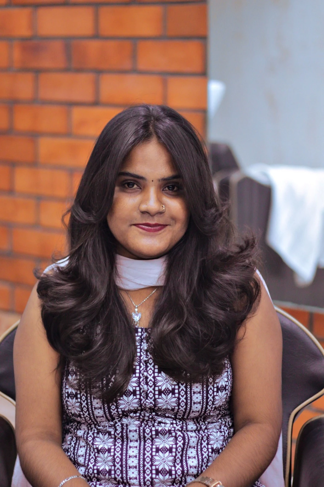 Glamorous curled blow-dry with rich volume