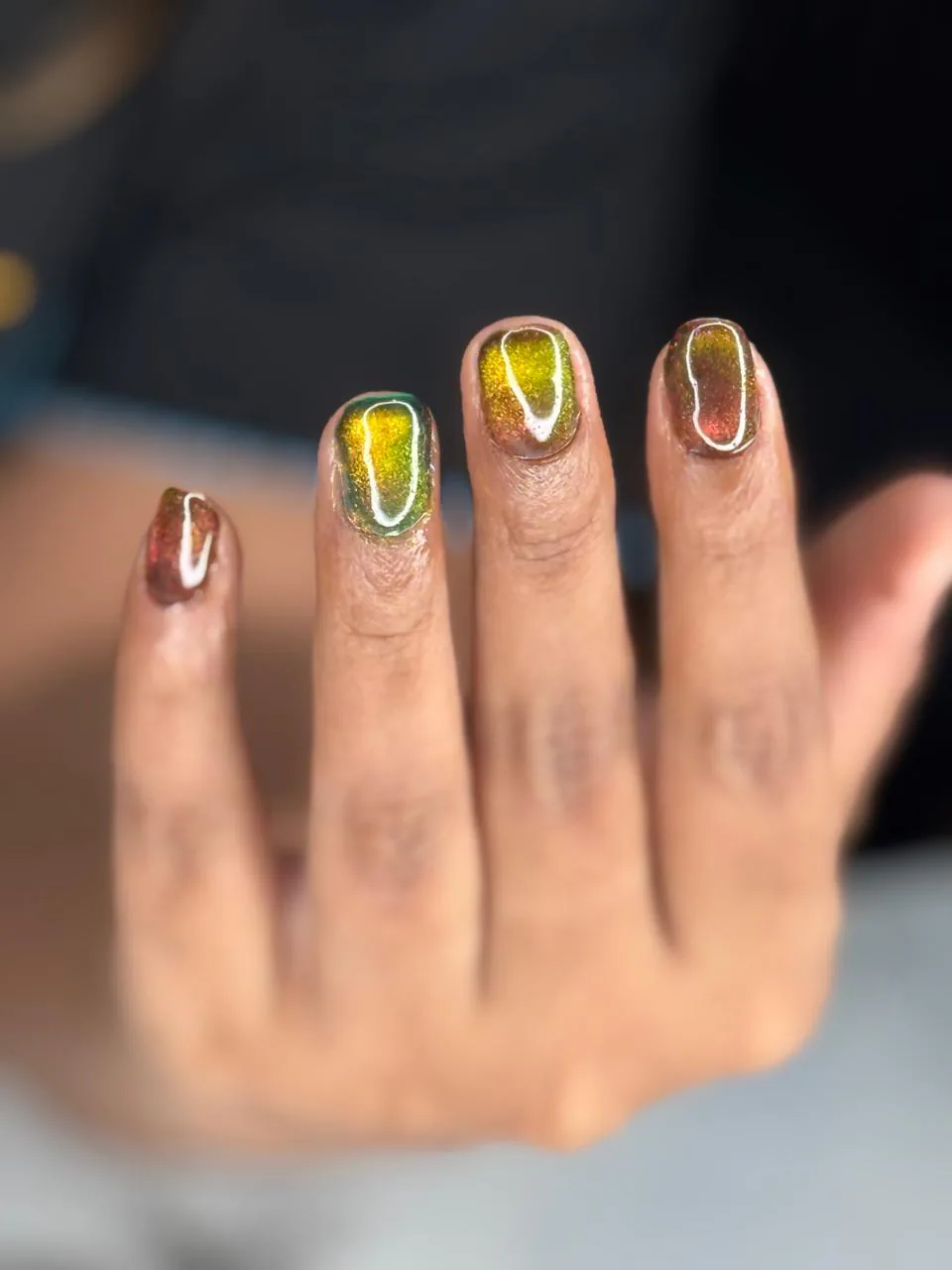 Creative nail art in warm tones