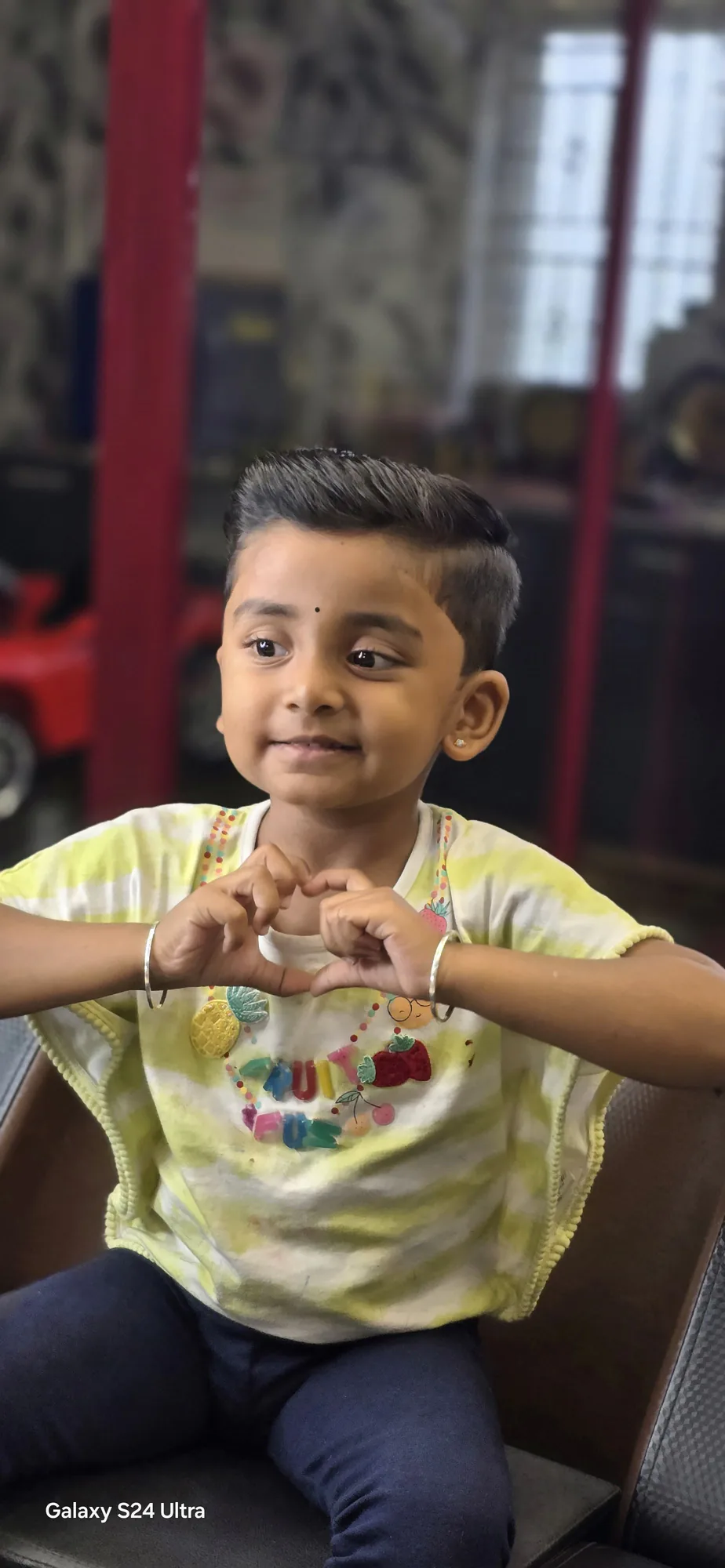 Neat kids' haircut with a happy smile