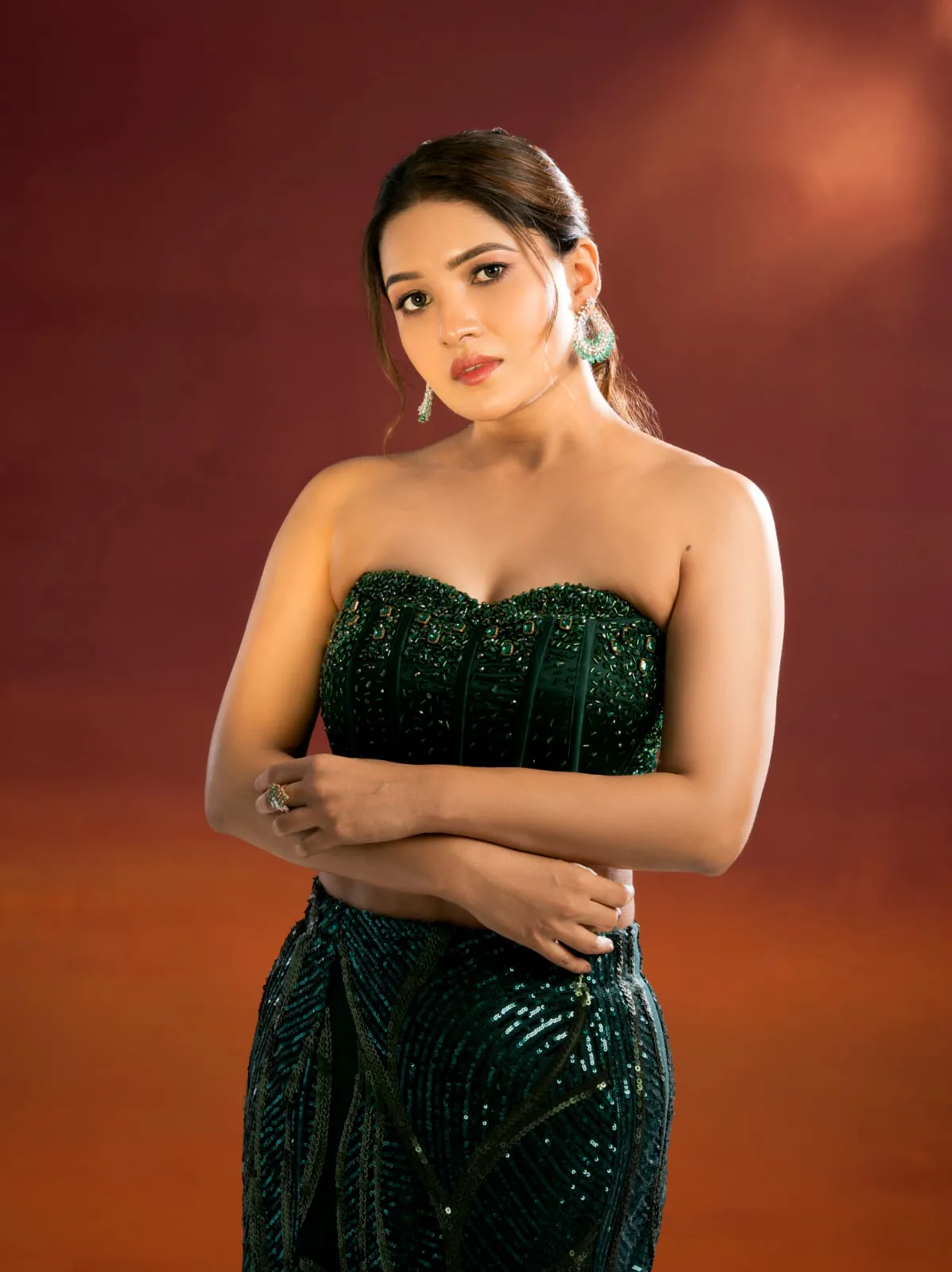 Elegant evening glam in a green gown
