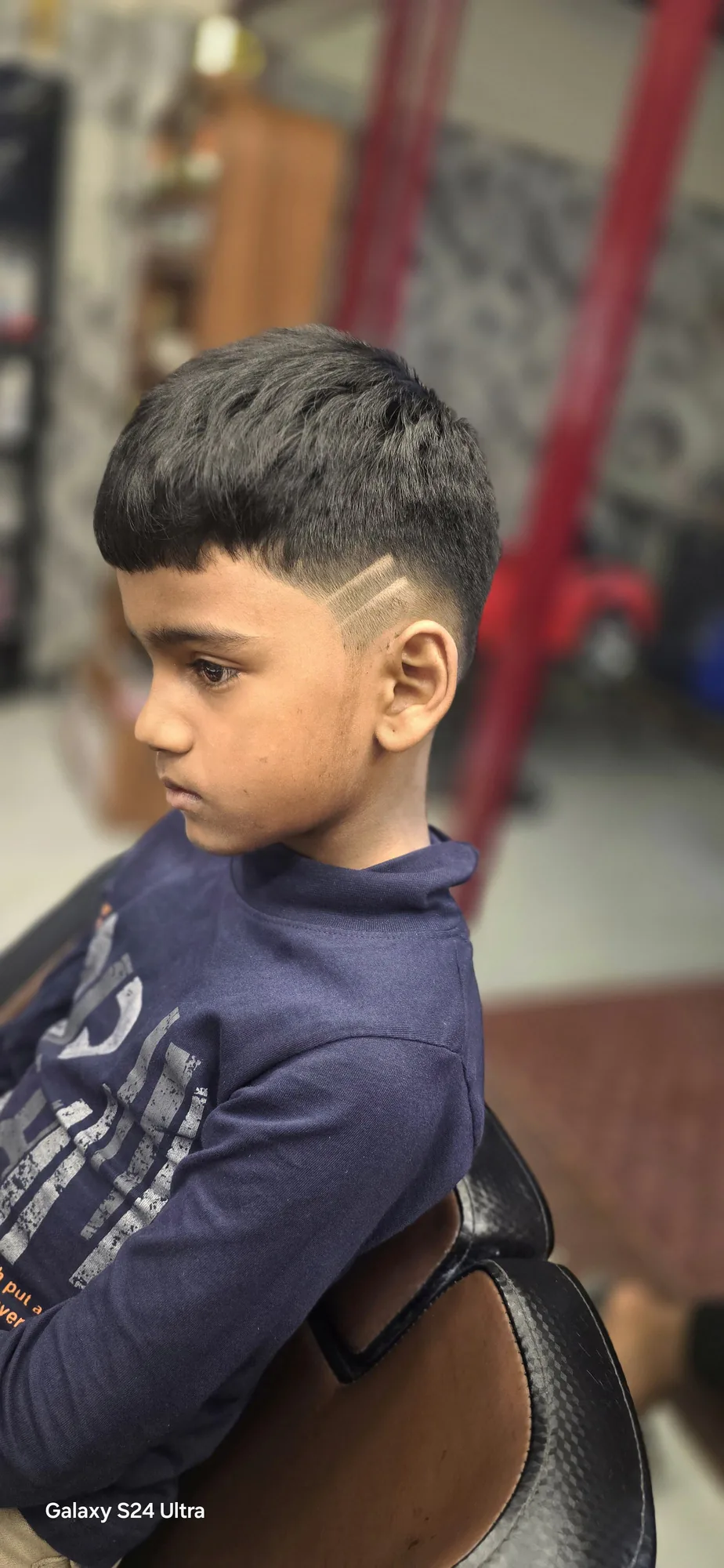 Sharp kids' haircut with a clean side design