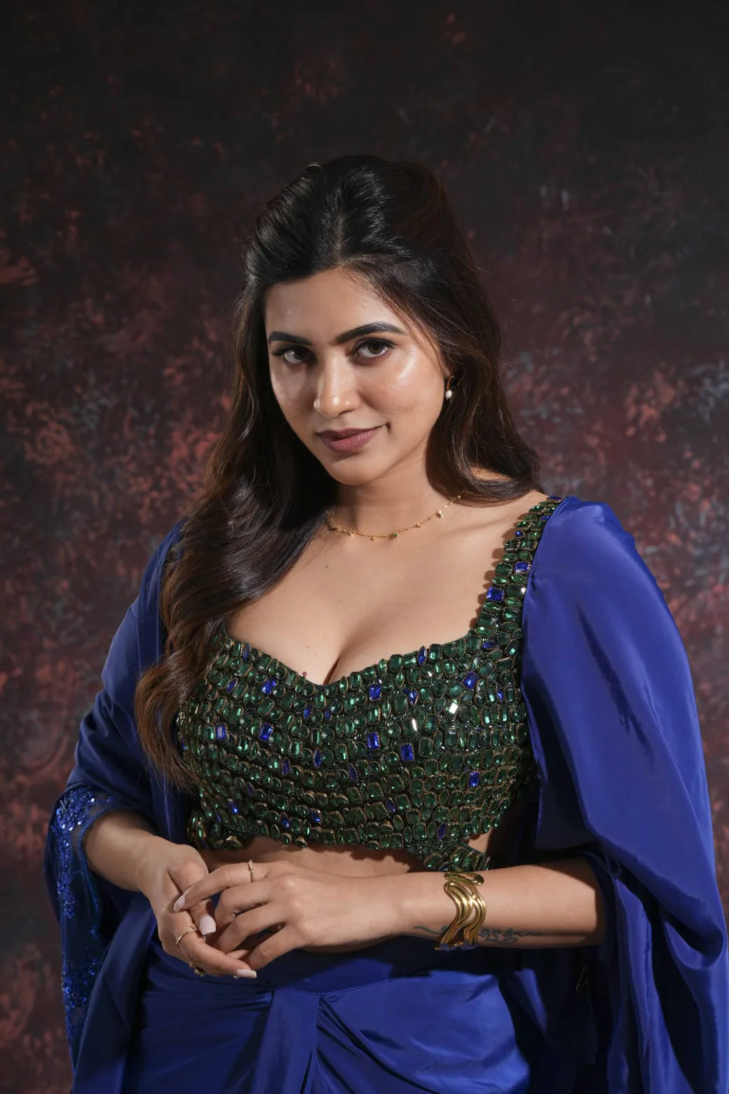 Bold party glam in a blue outfit