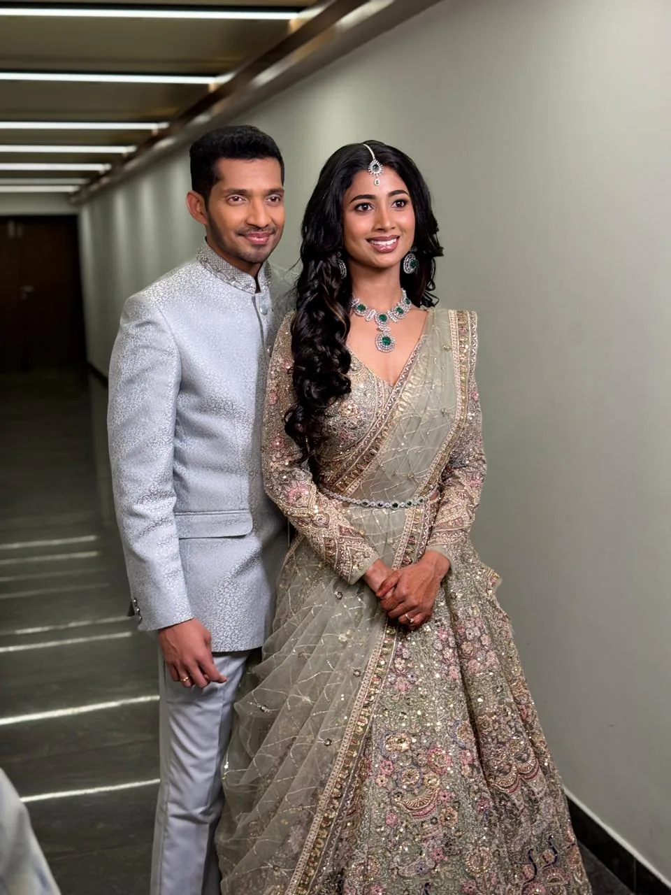 Bridal couple in elegant coordinated attire