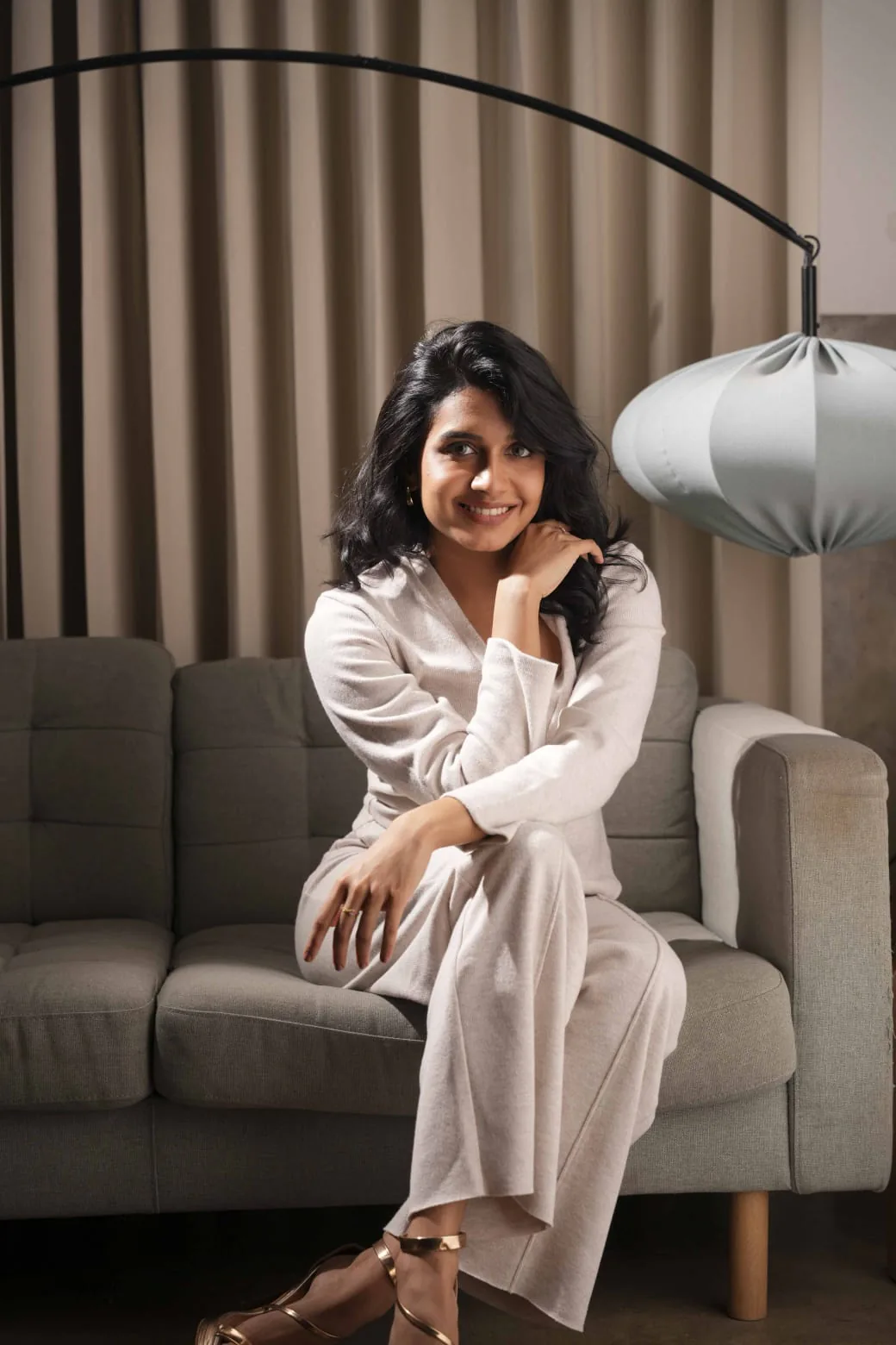 Chic seated portrait in an ivory outfit