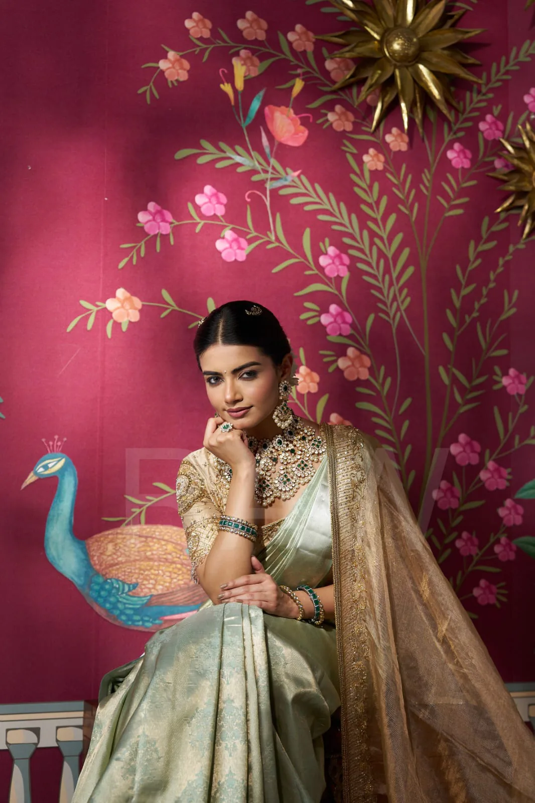 Bridal portrait against a regal peacock backdrop