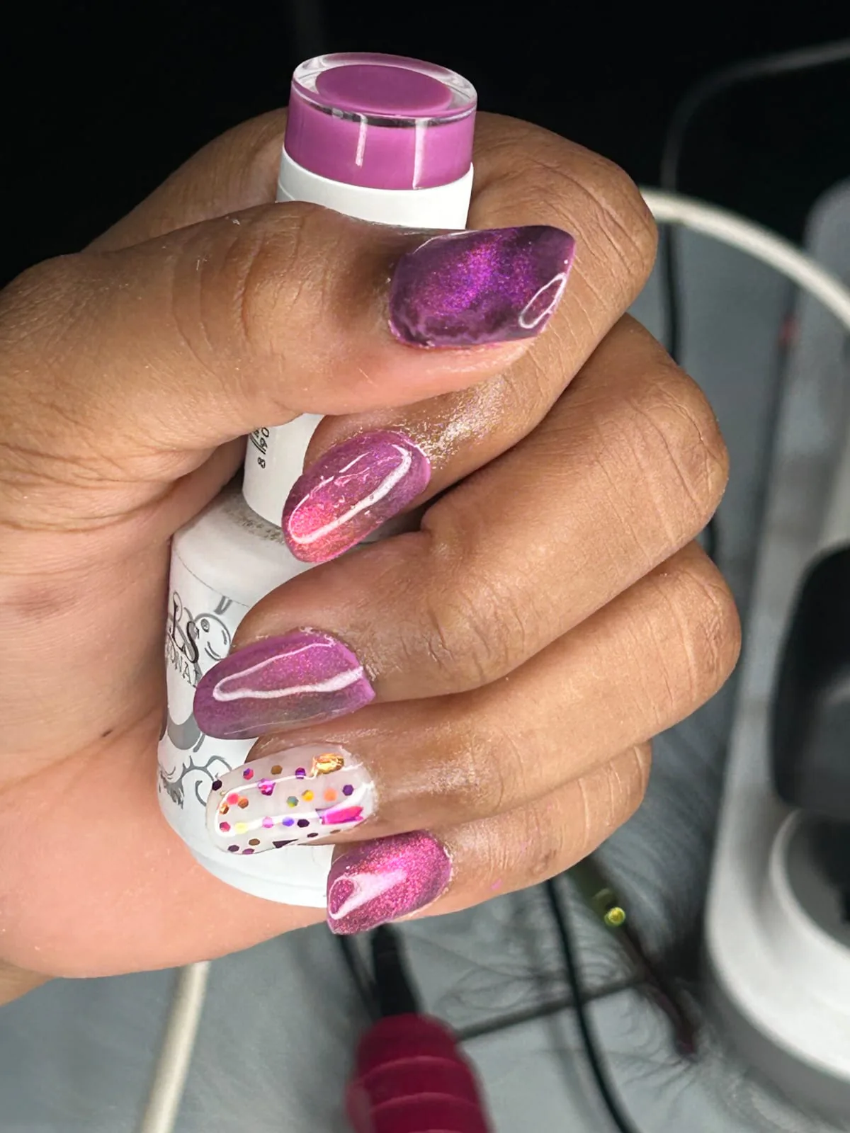 Glossy nail polish in a soft shade