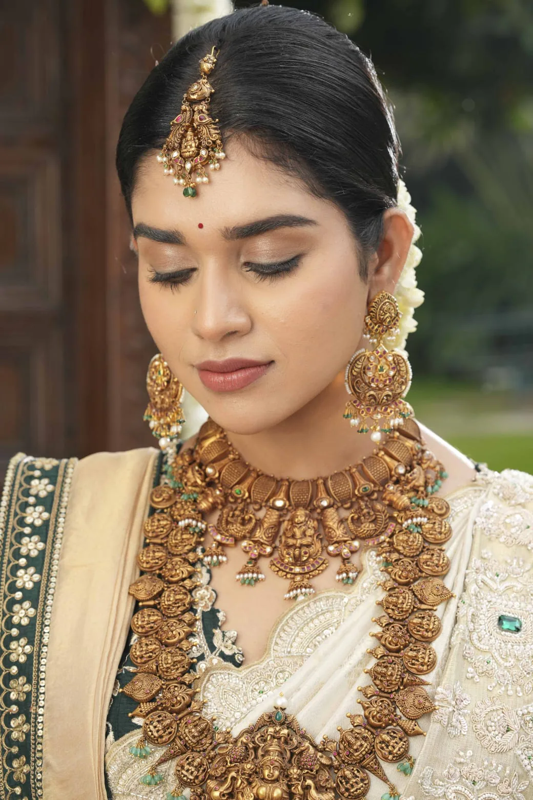 Traditional bridal jewellery and polished makeup
